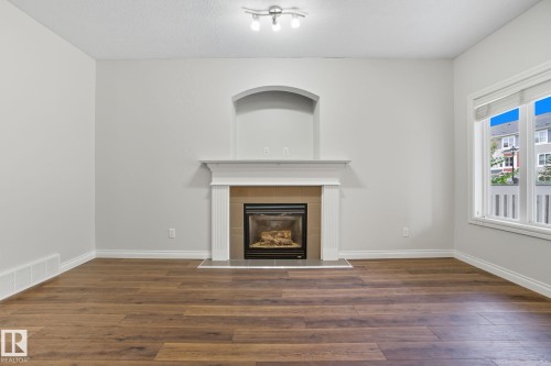 2209 Austin Way, Edmonton, AB - Indoor Photo Showing Living Room With Fireplace