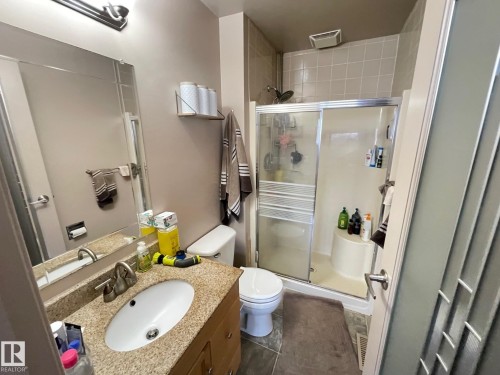 Full Ensuite bath with vanity and a stall shower - 324 Warwick Road, Edmonton, AB - Indoor Photo Showing Bathroom