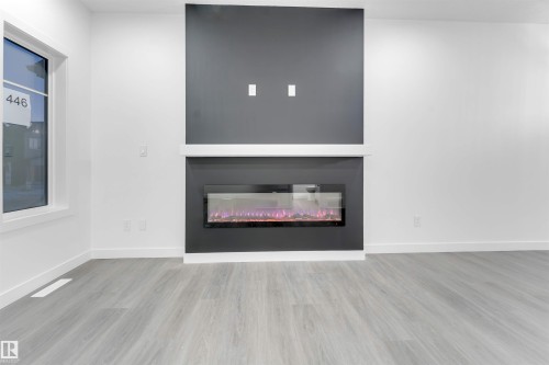 444 Crystal Creek Link, Leduc, AB - Indoor Photo Showing Living Room With Fireplace