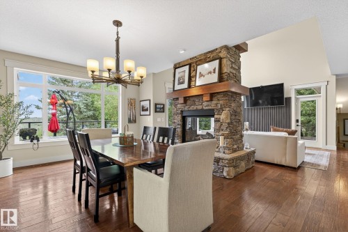 112 Windermere Drive, Edmonton, AB - Indoor Photo Showing Dining Room With Fireplace