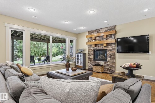 112 Windermere Drive, Edmonton, AB - Indoor Photo Showing Living Room With Fireplace