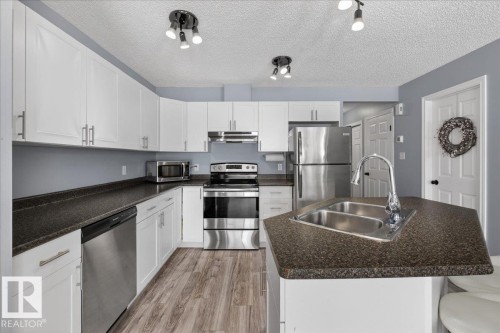 6828 159A Avenue, Edmonton, AB - Indoor Photo Showing Kitchen With Double Sink With Upgraded Kitchen