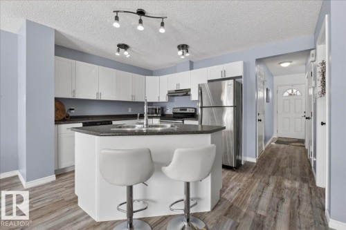 6828 159A Avenue, Edmonton, AB - Indoor Photo Showing Kitchen With Double Sink