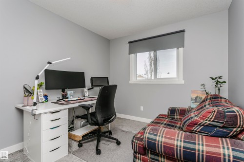 Office with light carpet and baseboards - 16420 15 Avenue, Edmonton, AB - Indoor Photo Showing Office