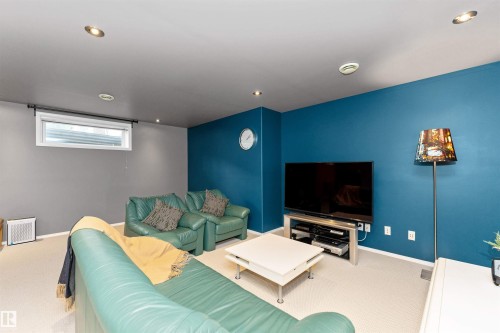 Living room with carpet floors and recessed lighting - 357 Blackburn Drive E, Edmonton, AB - Indoor Photo Showing Other Room