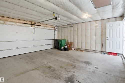 317 Juniper Cove, Leduc, AB - Indoor Photo Showing Garage