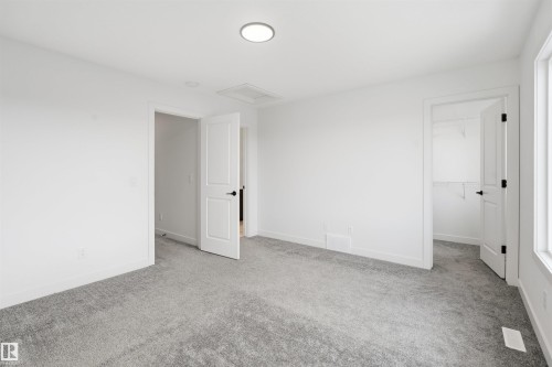 317 Juniper Cove, Leduc, AB - Indoor Photo Showing Other Room