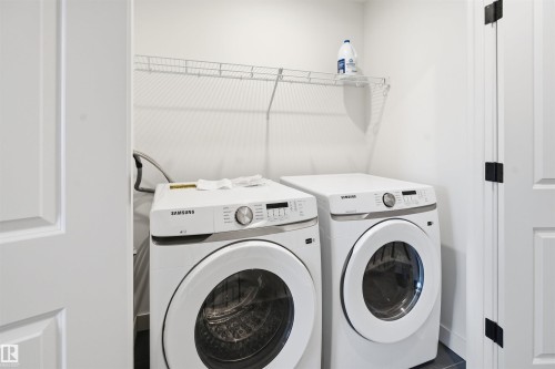 317 Juniper Cove, Leduc, AB - Indoor Photo Showing Laundry Room