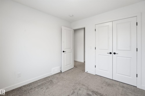 317 Juniper Cove, Leduc, AB - Indoor Photo Showing Other Room