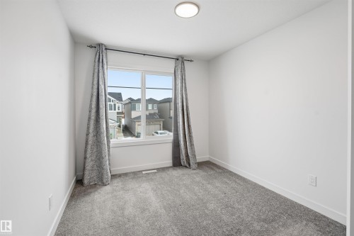 317 Juniper Cove, Leduc, AB - Indoor Photo Showing Other Room