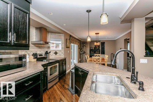 69 Deane Crescent, St. Albert, AB - Indoor Photo Showing Kitchen With Stainless Steel Kitchen With Double Sink With Upgraded Kitchen
