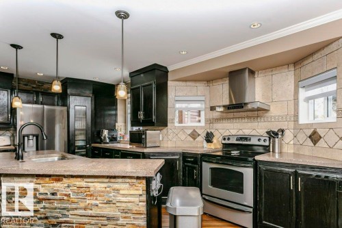 69 Deane Crescent, St. Albert, AB - Indoor Photo Showing Kitchen With Stainless Steel Kitchen With Upgraded Kitchen
