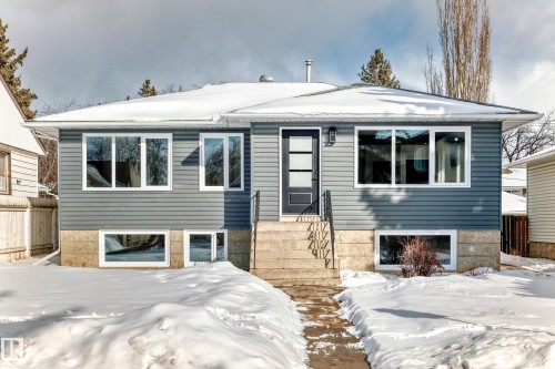 View of front of home featuring entry steps - 8712 89 Avenue, Edmonton, AB - Outdoor With Facade