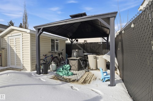 View of patio / terrace with a gazebo and a storage shed - 4204 41B Street, Leduc, AB - Outdoor With Exterior