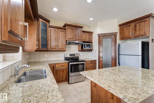 3621 28A Street, Edmonton, AB - Indoor Photo Showing Kitchen With Double Sink