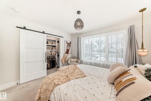7642 91 Avenue, Edmonton, AB - Indoor Photo Showing Bedroom