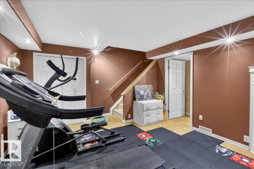 Workout room with baseboards and light colored carpet - 4519 Turner Square Square, Edmonton, AB - Indoor Photo Showing Other Room