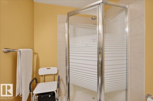 Full bath featuring a stall shower - 4519 Turner Square Square, Edmonton, AB - Indoor Photo Showing Bathroom