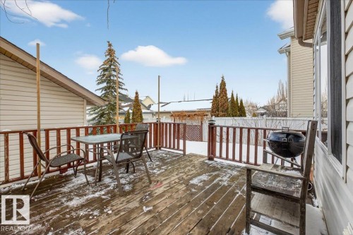 Snow covered deck featuring outdoor dining space - 4519 Turner Square Square, Edmonton, AB - Outdoor With Deck Patio Veranda With Exterior