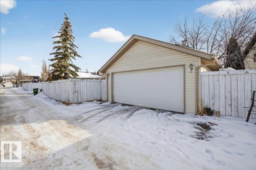 Snow covered garage with a detached garage - 4519 Turner Square Square, Edmonton, AB - Outdoor