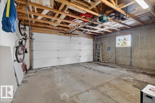 Garage with a garage door opener - 4519 Turner Square Square, Edmonton, AB - Indoor Photo Showing Garage