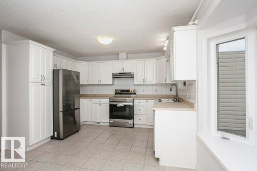 10342 150 Street, Edmonton, AB - Indoor Photo Showing Kitchen With Double Sink