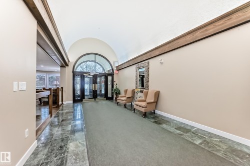 Building lobby featuring a barrel ceiling - 118 6220 Fulton Road, Edmonton, AB - Indoor Photo Showing Other Room