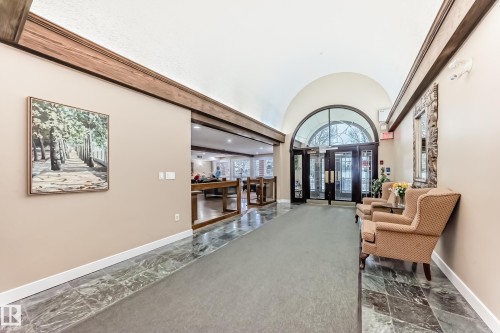Lobby featuring a barrel ceiling - 118 6220 Fulton Road, Edmonton, AB - Indoor Photo Showing Other Room
