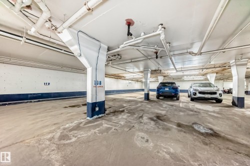 Garage featuring a parking deck - 118 6220 Fulton Road, Edmonton, AB - Indoor Photo Showing Garage