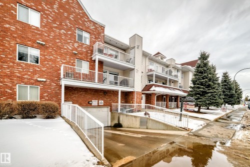 Snow covered building with a view of apartment building / complex - 118 6220 Fulton Road, Edmonton, AB - Outdoor