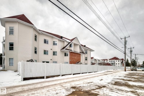 View of snowy exterior featuring a residential view - 118 6220 Fulton Road, Edmonton, AB - Outdoor