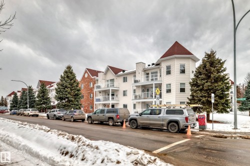 Snow covered property with a view of apartment building / complex - 118 6220 Fulton Road, Edmonton, AB - Outdoor With Facade
