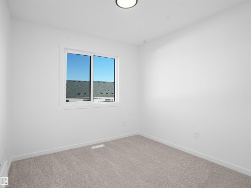 62 525 Secord Boulevard, Edmonton, AB - Indoor Photo Showing Other Room