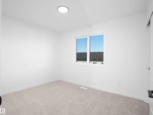 62 525 Secord Boulevard, Edmonton, AB - Indoor Photo Showing Other Room
