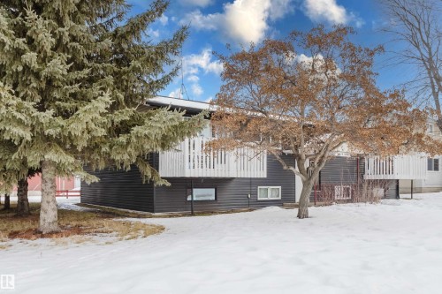 Snow covered property - 3917/3919 54 Street, Wetaskiwin, AB - Outdoor