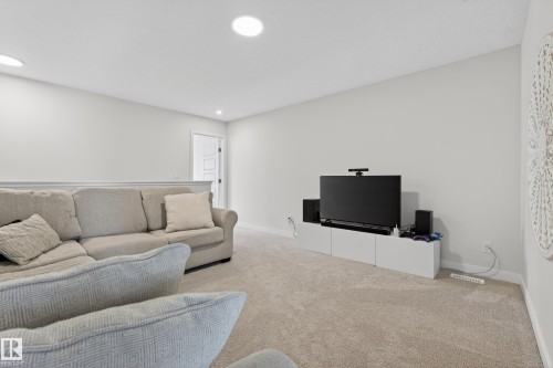 Living room with carpet and recessed lighting - 19286 22A Avenue, Edmonton, AB 