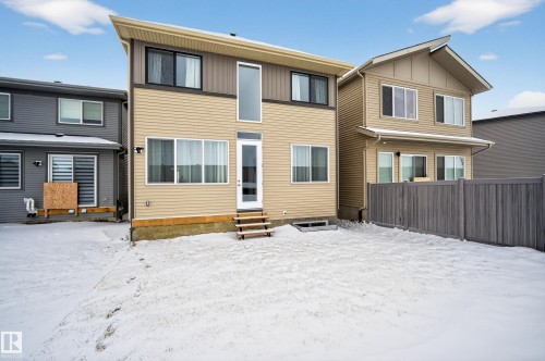 Snow covered rear of property with entry steps - 19286 22A Avenue, Edmonton, AB 