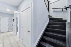 Stairs featuring baseboards - 