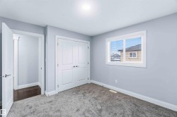 Unfurnished bedroom featuring a closet and carpet flooring - 