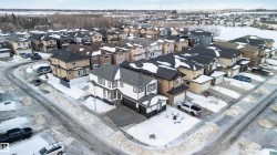 Snowy aerial view with a residential view - 