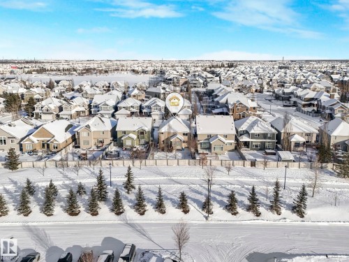 Snowy aerial view featuring a residential view - 960 Summerside Link, Edmonton, AB - Outdoor With View