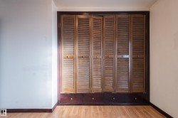 Detailed view of wood finished floors and baseboards - 