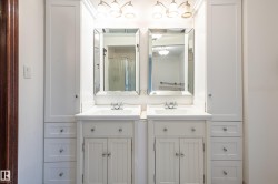 Bathroom with a shower with shower curtain and vanity - 