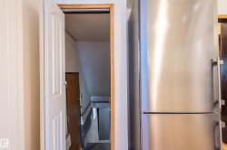 Kitchen with freestanding refrigerator - 