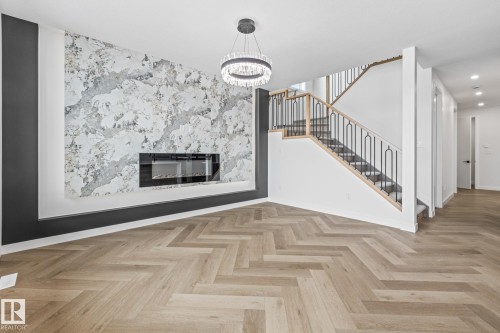 416 Pine Point(E), Leduc, AB - Indoor With Fireplace