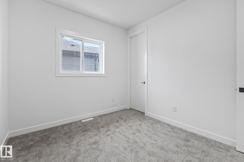 416 Pine Point(E), Leduc, AB - Indoor Photo Showing Other Room