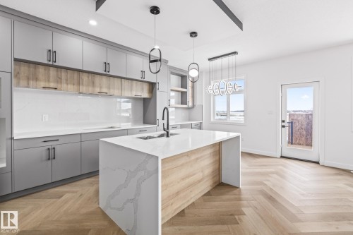 416 Pine Point(E), Leduc, AB - Indoor Photo Showing Kitchen With Double Sink With Upgraded Kitchen