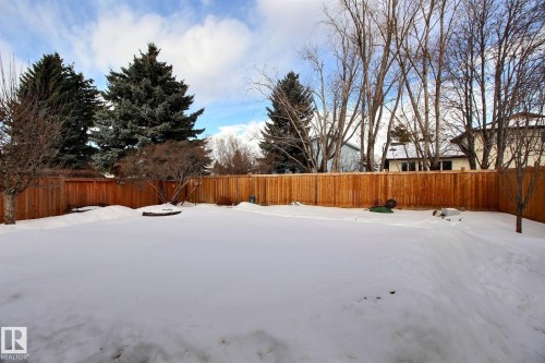 Snowy yard featuring a fenced backyard - 4520 20A Avenue, Edmonton, AB - Outdoor