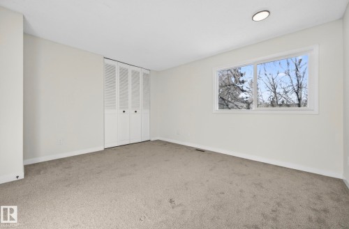 Unfurnished bedroom featuring carpet and a closet - 9969 171 Avenue, Edmonton, AB - Indoor Photo Showing Other Room
