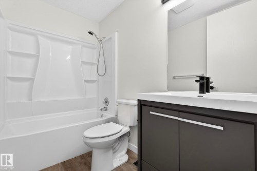 Full bath with vanity and tub / shower combination - 9969 171 Avenue, Edmonton, AB - Indoor Photo Showing Bathroom